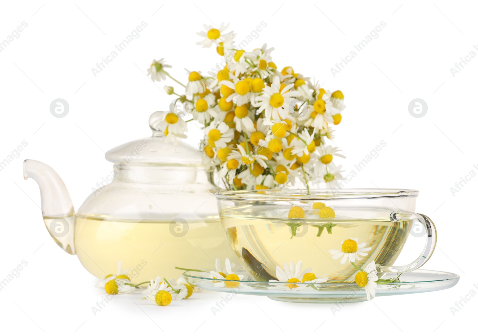 Photo of Aromatic herbal tea with chamomile flowers isolated on white