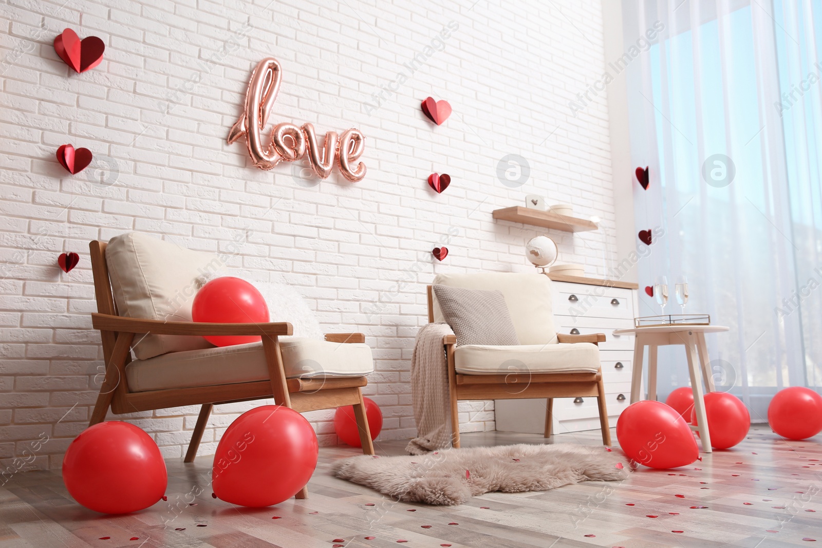 Photo of Cozy living room decorated for Valentine Day. Interior design