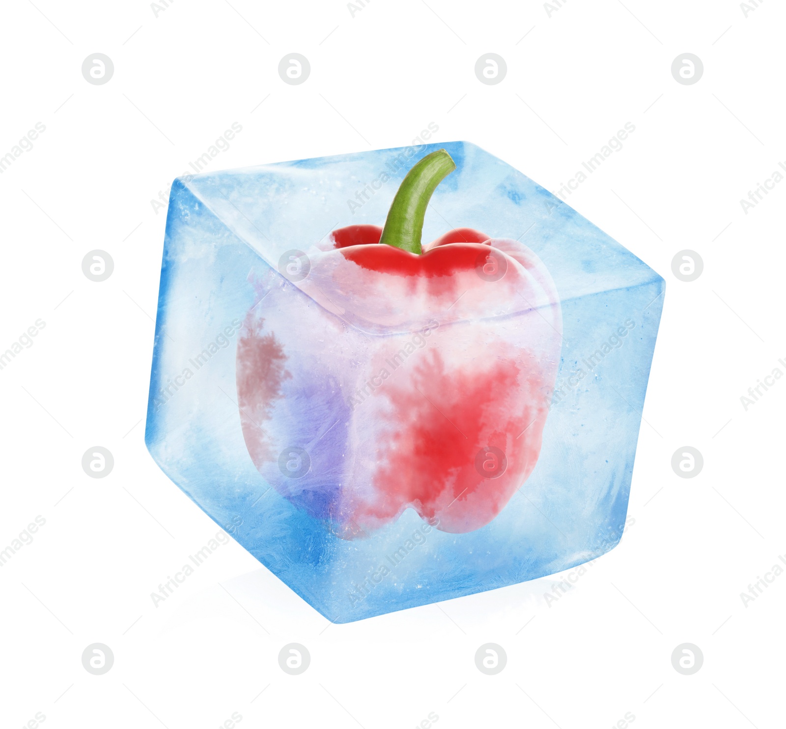 Image of Frozen food. Raw bell pepper in ice cube isolated on white