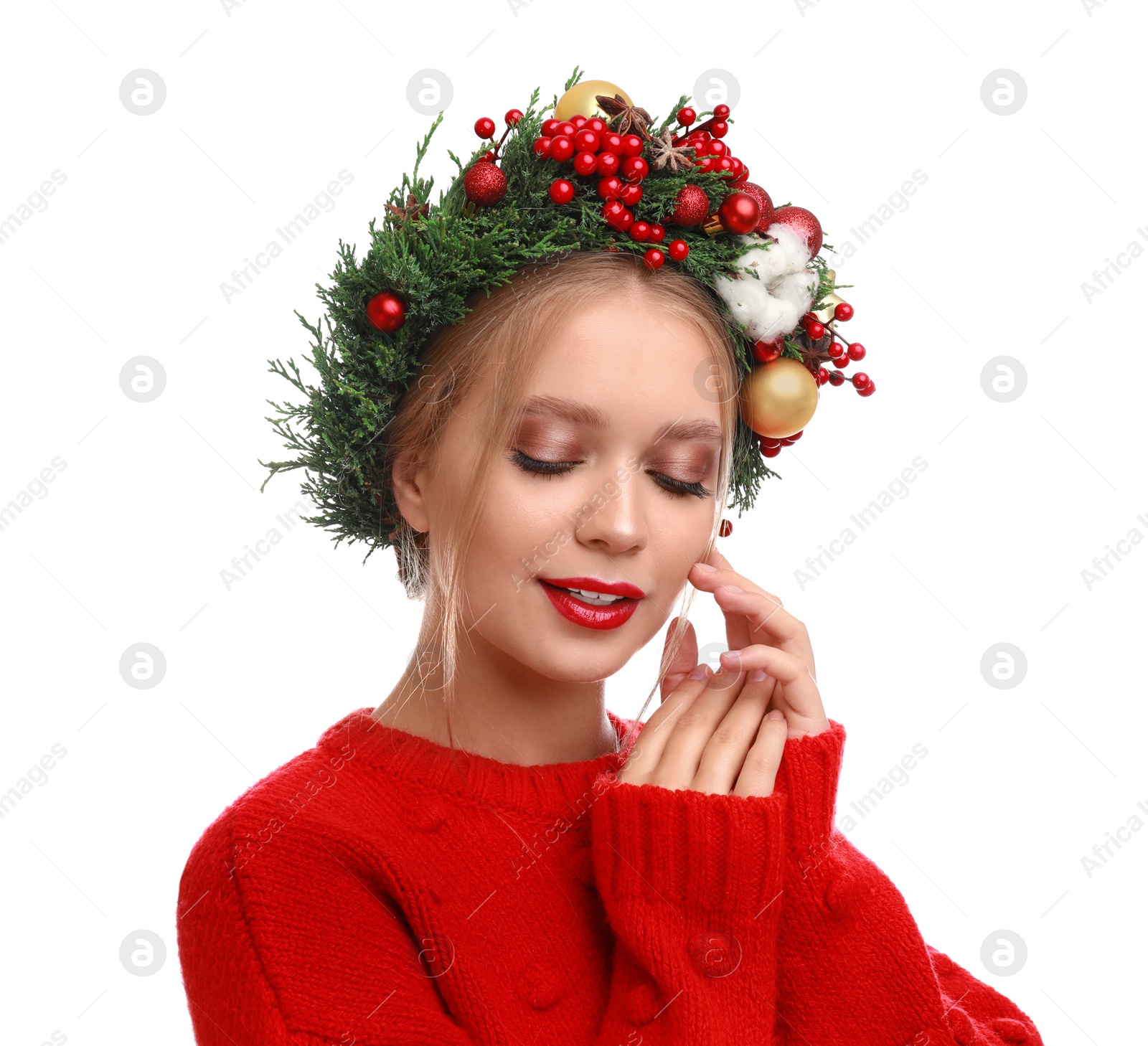 Photo of Beautiful young woman wearing Christmas wreath on white background