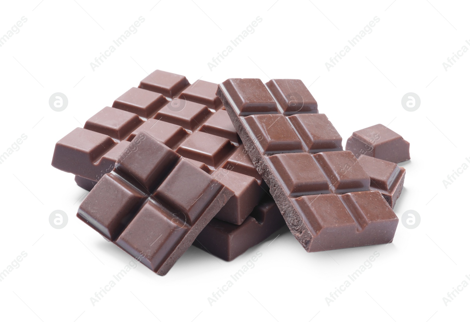 Photo of Pieces of delicious milk chocolate isolated on white