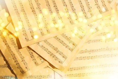 Christmas and New Year music. Music sheets, bokeh effect