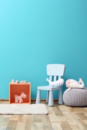Photo of Stylish children's room interior with toys and new furniture, space for text