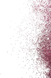 Photo of Pink glitter on white background, top view