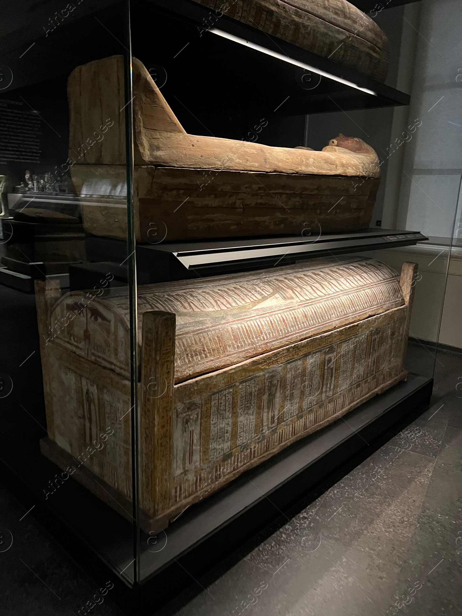 Photo of LEIDEN, NETHERLANDS - AUGUST 07, 2022: Display with Ancient Egyptian sarcophagi in National Museum of Antiquities (Rijksmuseum van Oudheden)