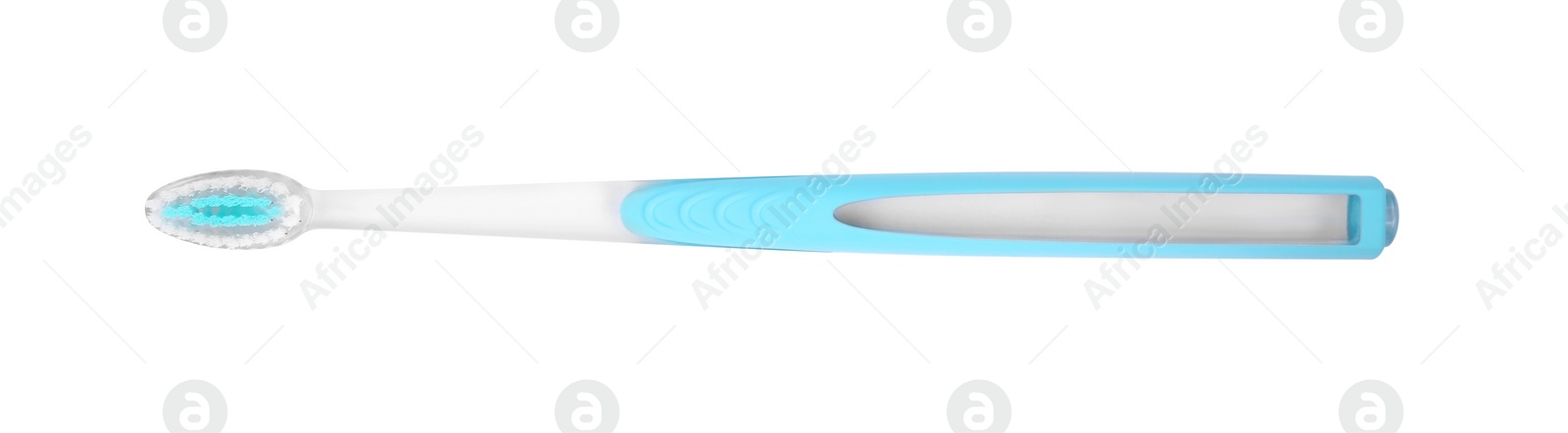 Photo of Light blue plastic toothbrush isolated on white, top view