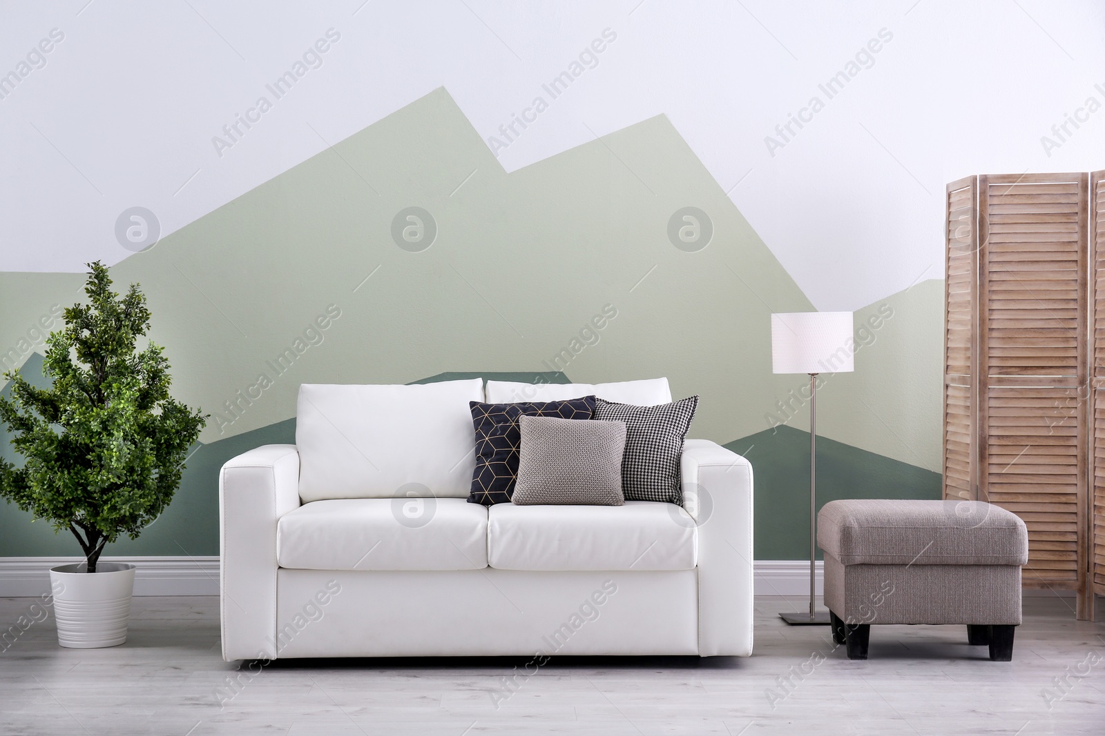 Photo of Living room interior with comfortable sofa