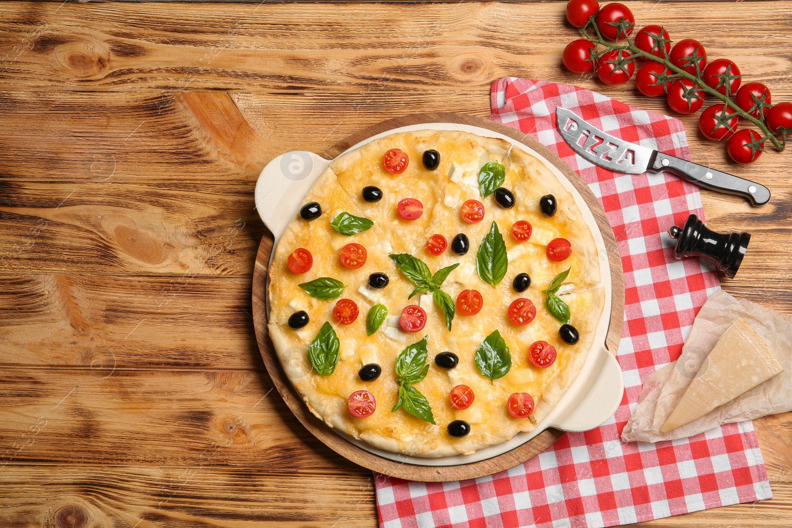 Photo of Flat lay composition with tasty homemade pizza and space for text on wooden table