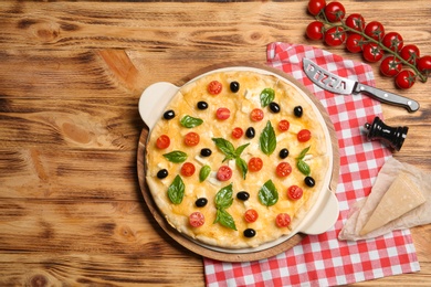 Flat lay composition with tasty homemade pizza and space for text on wooden table