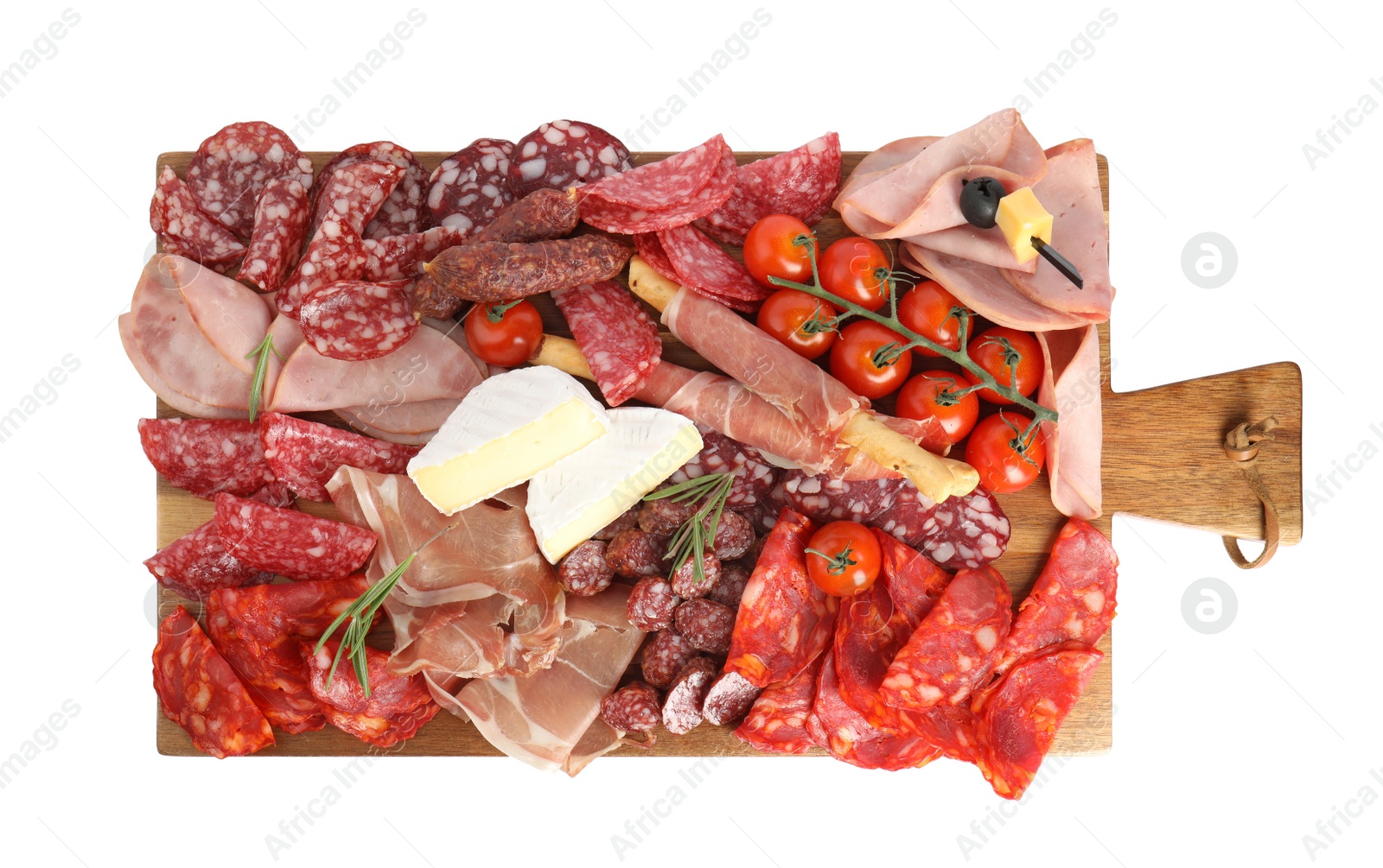 Photo of Wooden board with tasty ham and other delicacies isolated on white, top view