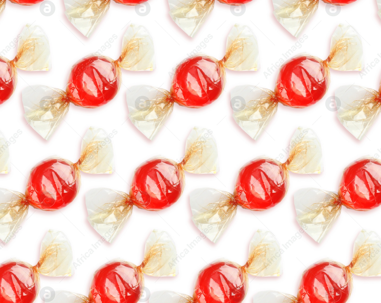 Image of Tasty candies on white background. Pattern design