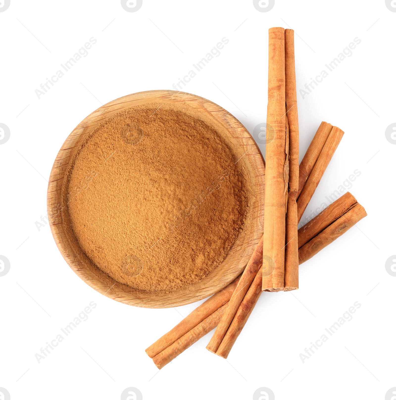 Photo of Dry aromatic cinnamon sticks and powder isolated on white, top view