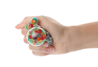 Woman squeezing colorful slime isolated on white, closeup. Antistress toy