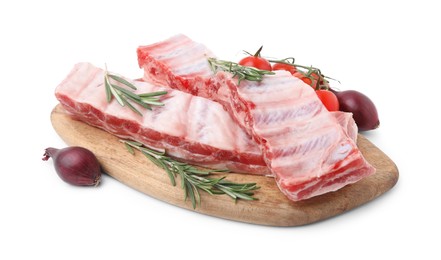Photo of Raw pork ribs, rosemary, tomatoes and onions isolated on white