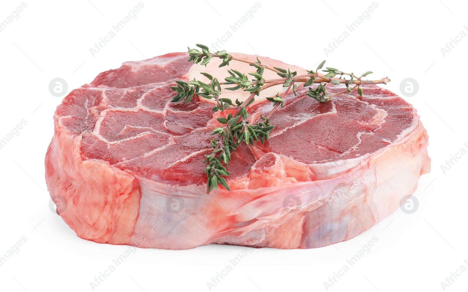 Photo of Piece of raw beef meat and thyme isolated on white