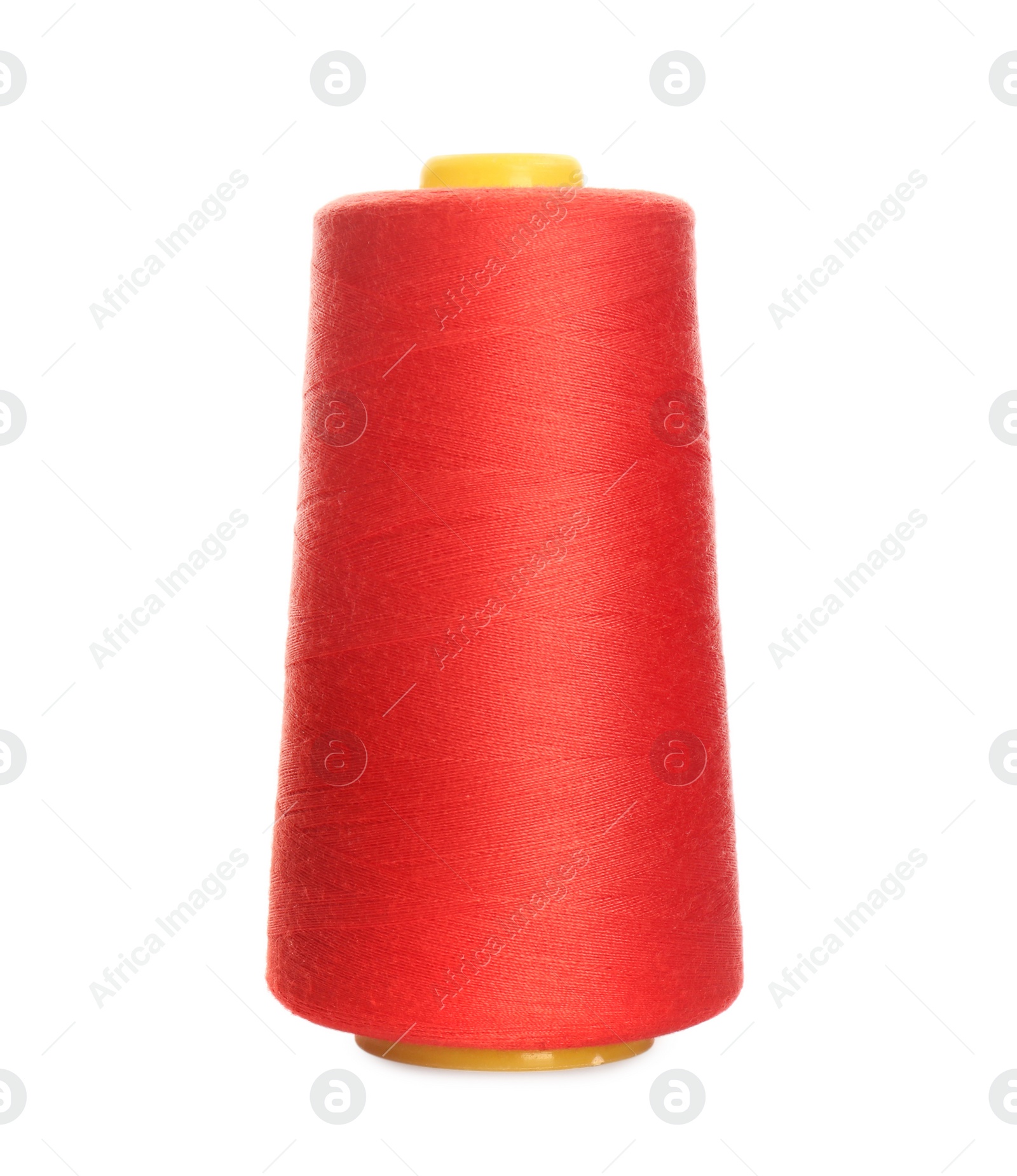 Photo of Spool of red sewing thread isolated on white