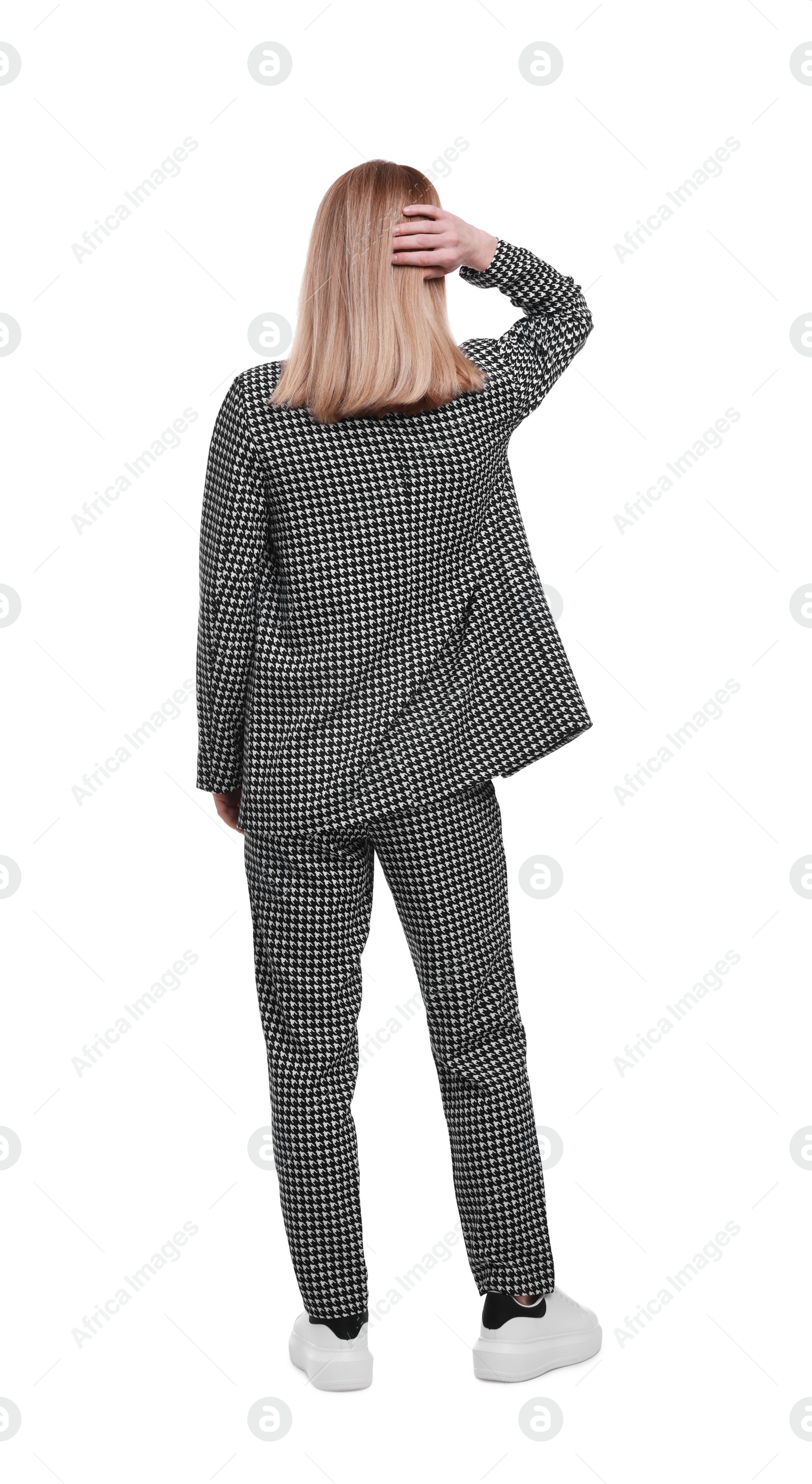 Photo of Businesswoman in suit on white background, back view