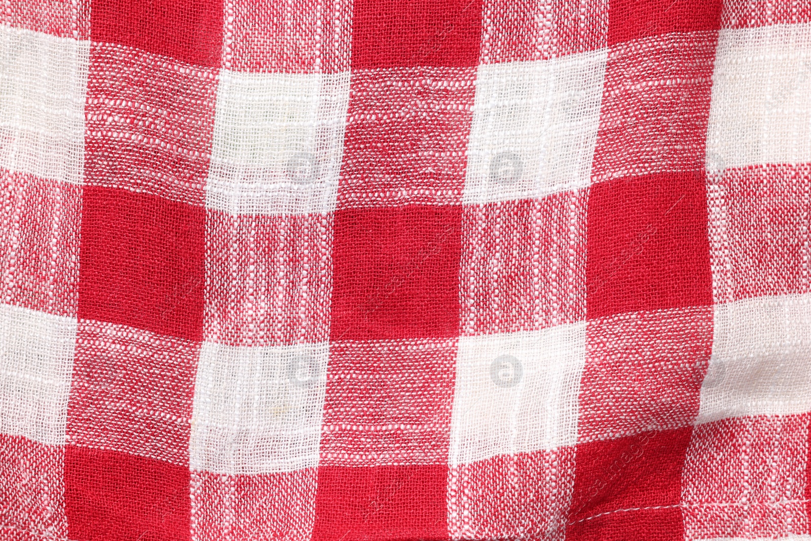 Photo of Texture of checkered fabric as background, top view