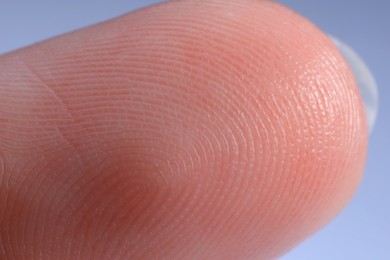 Photo of Macro view of finger with friction ridges
