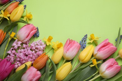 Photo of Beautiful different flowers on green background, flat lay. Space for text