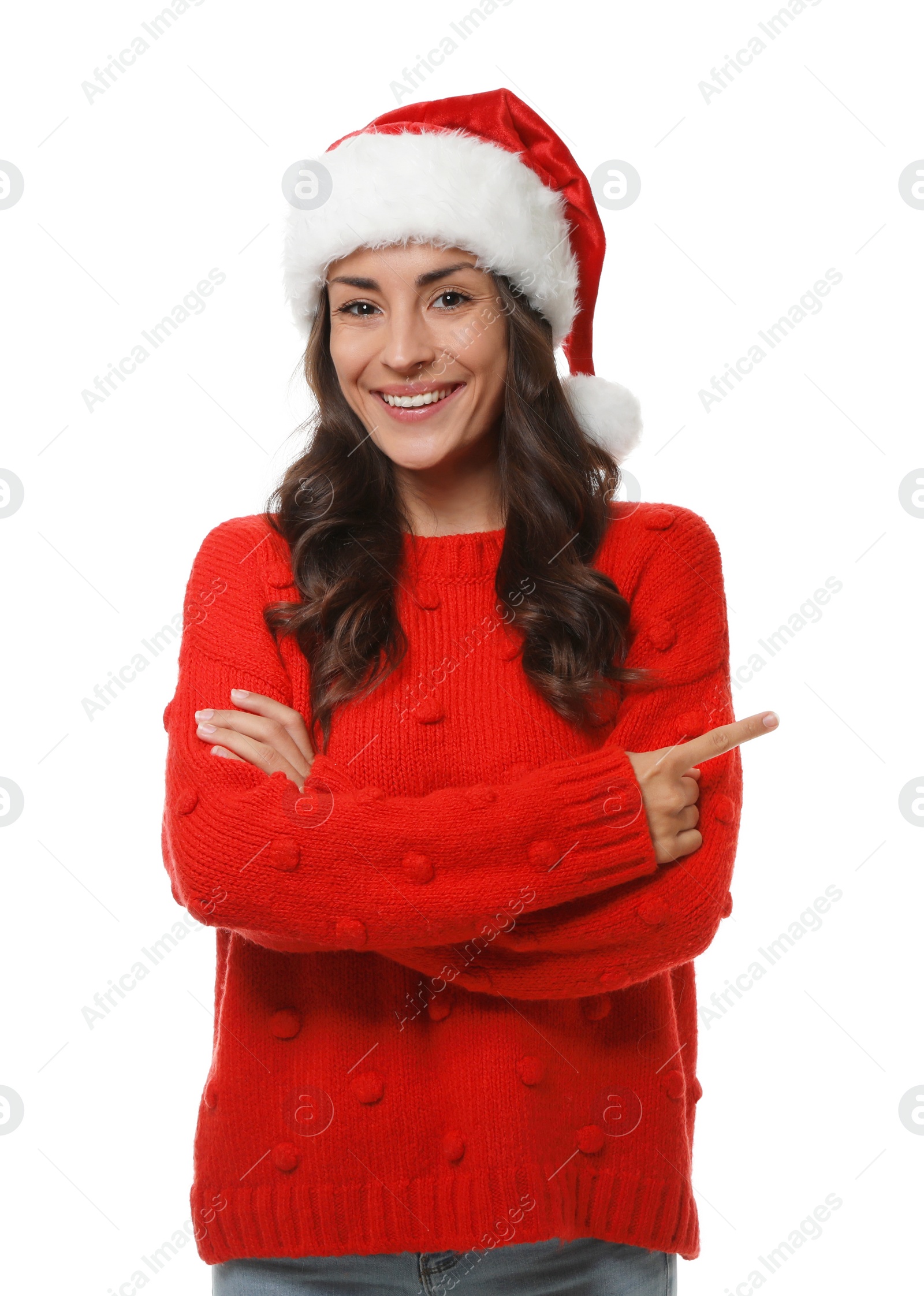 Photo of Young woman in Christmas sweater and hat on white background