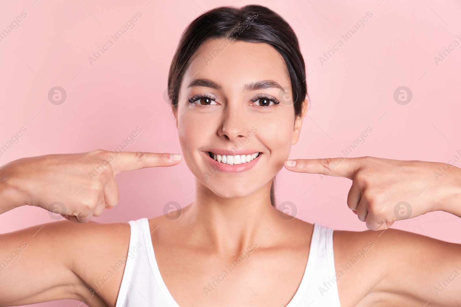 Photo of Young woman with healthy teeth on color background