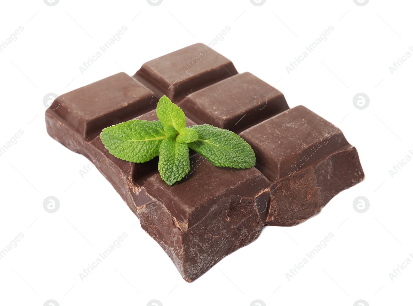 Photo of Tasty chocolate piece with mint on white background