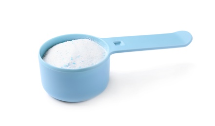 Photo of Measuring spoon with laundry powder isolated on white