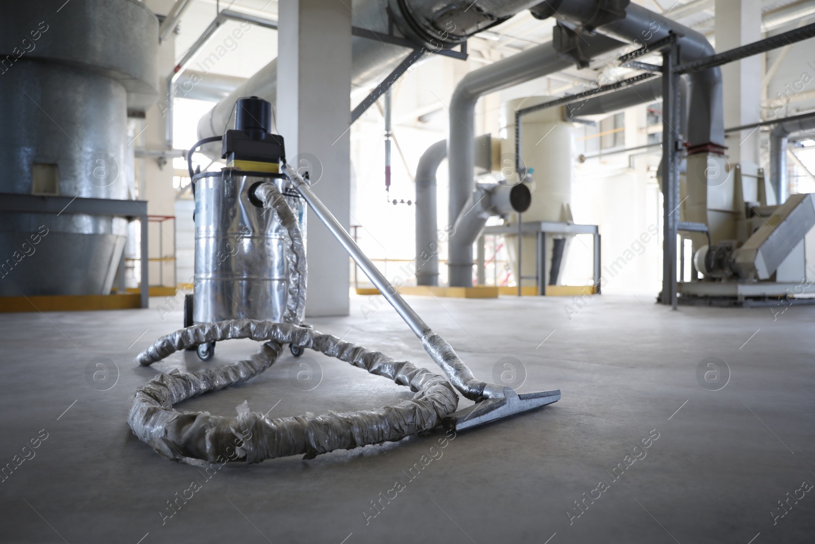 Photo of Modern granary with different equipment, inside view