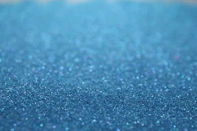 Photo of Shiny light blue glitter as background. Bokeh effect