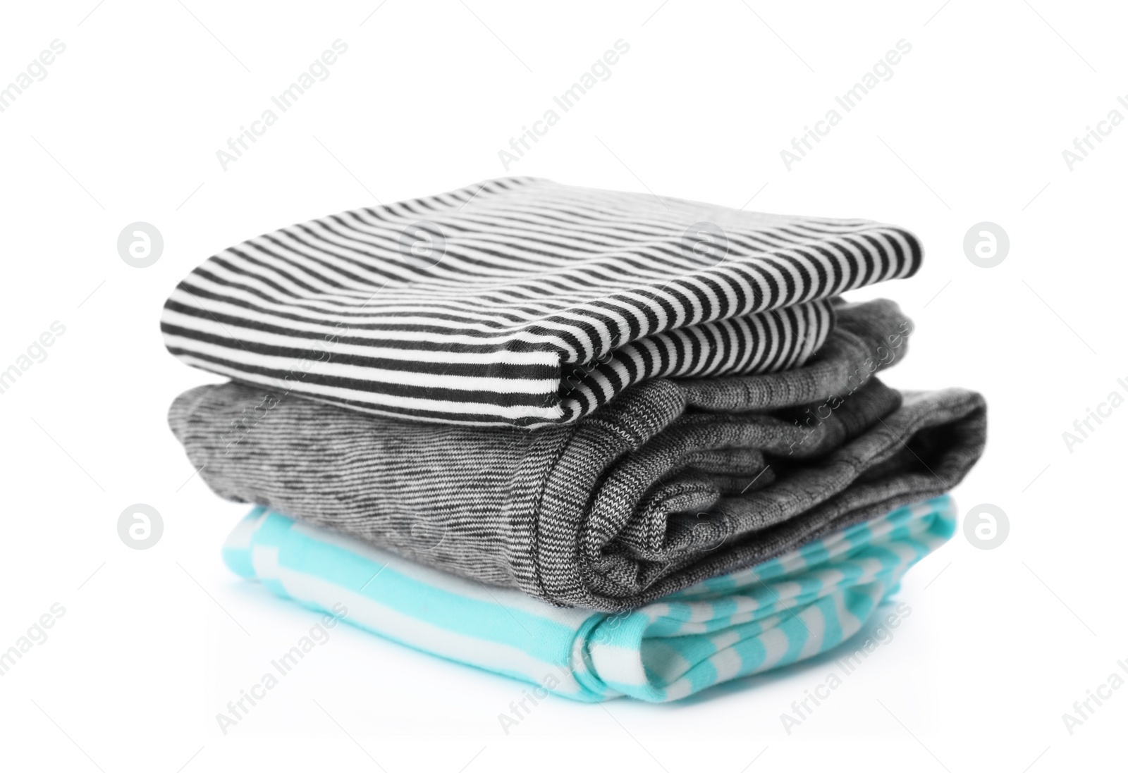 Photo of Stack of folded child clothes isolated on white