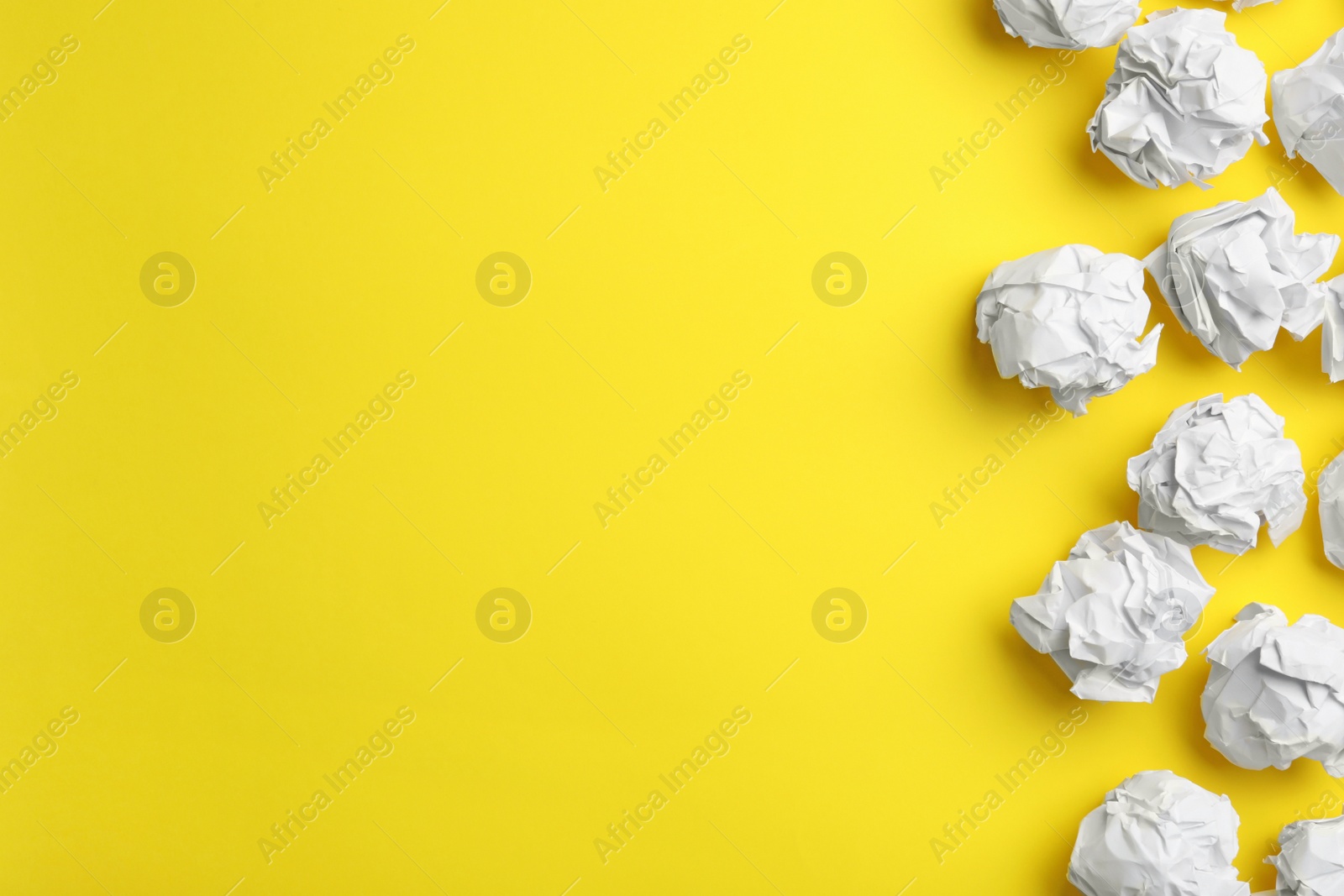 Photo of Paper balls on color background, flat lay. Space for text