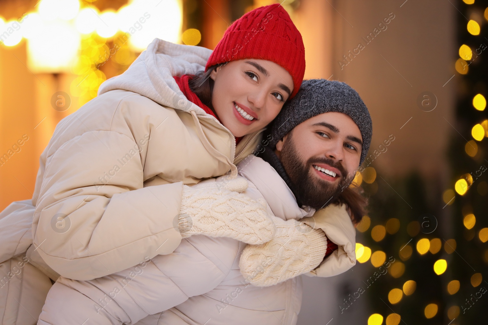 Photo of Lovely couple spending time together on city street