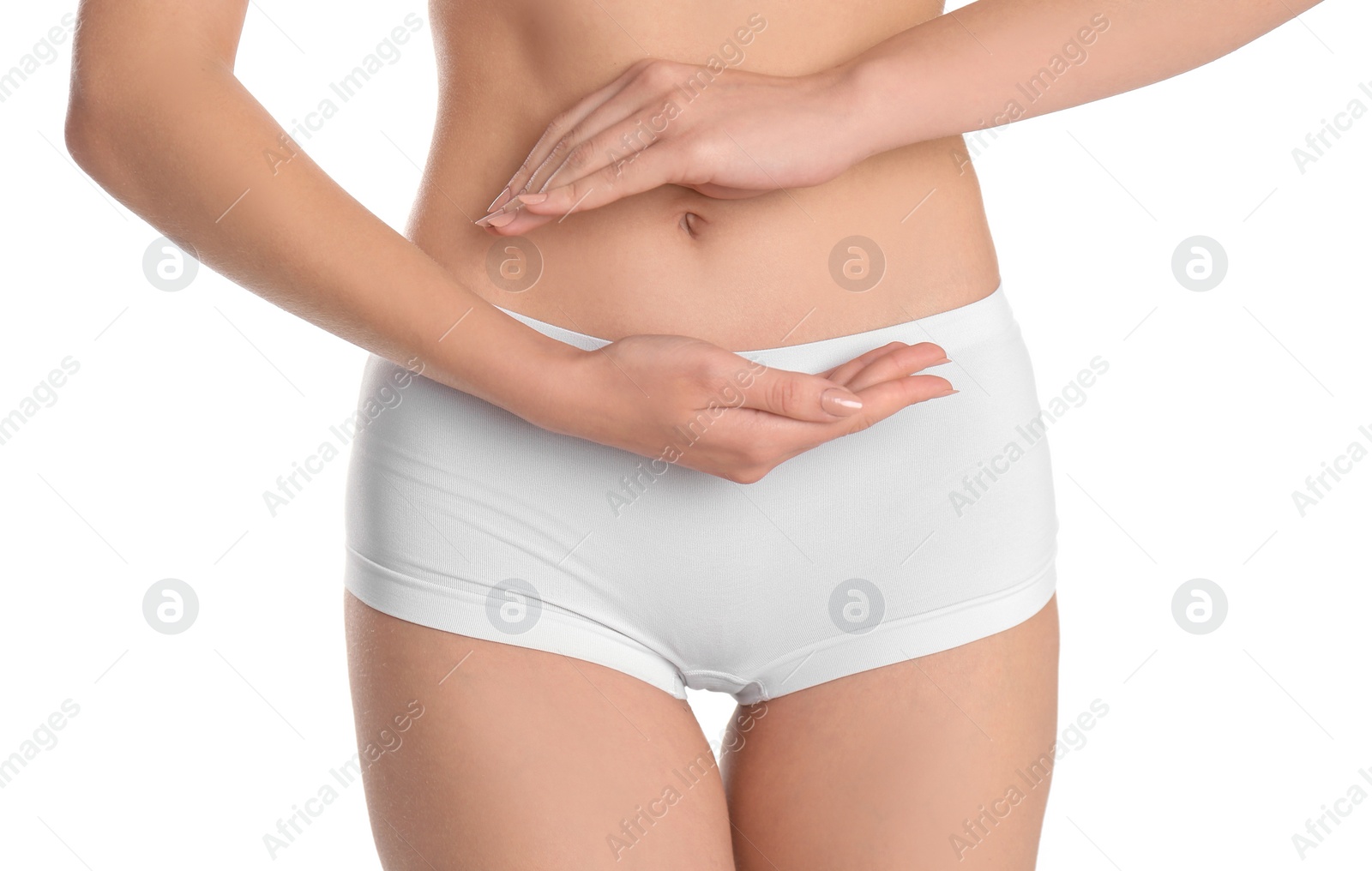 Photo of Young woman holding hands near underwear on white background. Gynecology