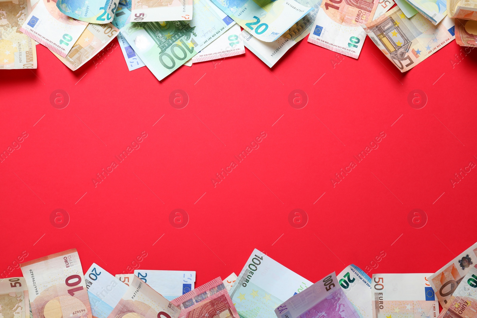 Image of Frame of money on red background, flat lay. Space for text