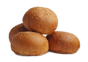 Photo of Stack of fresh tasty buns with sesame seeds isolated on white