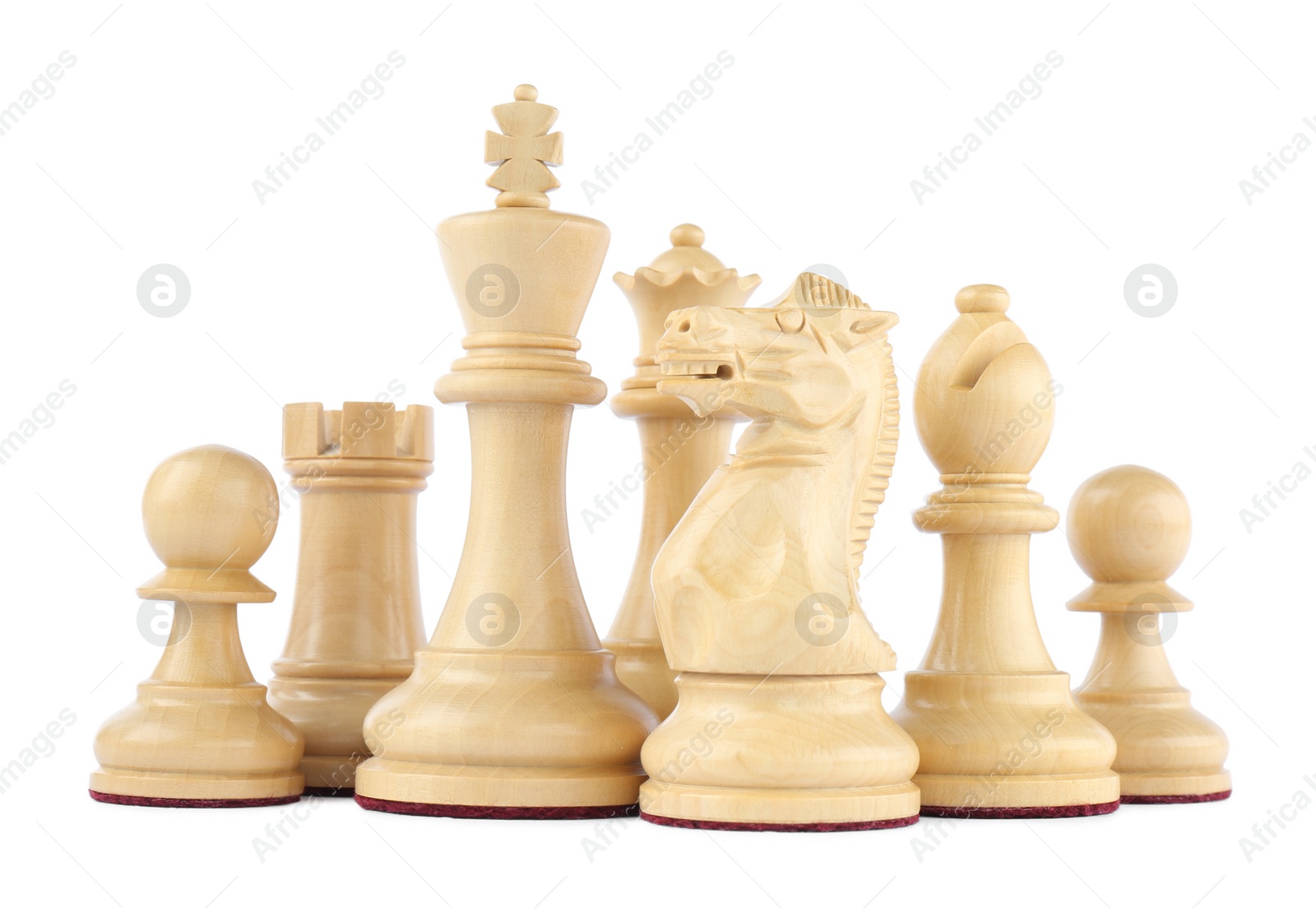 Photo of Set of wooden chess pieces on white background