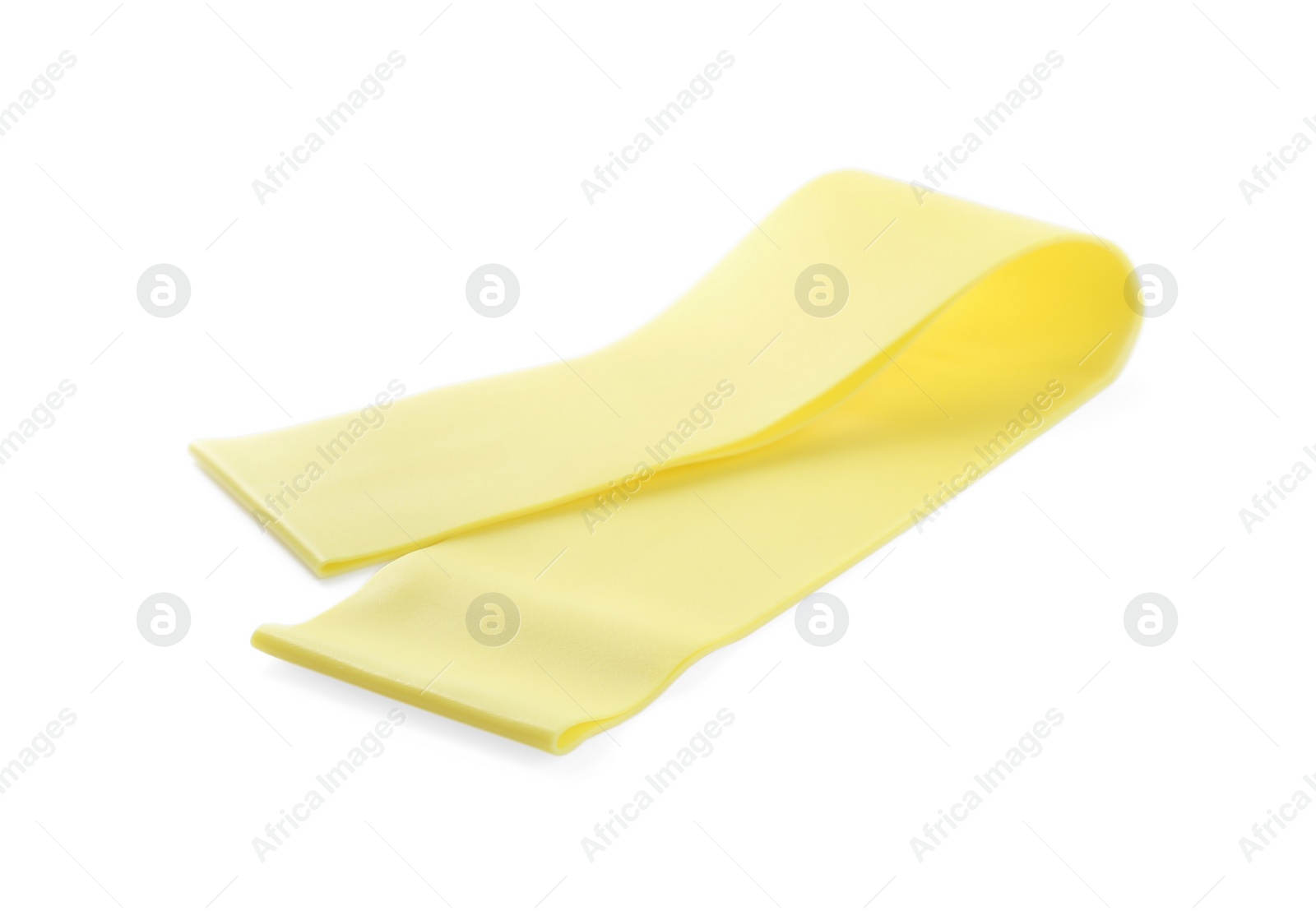 Photo of Yellow elastic resistance band isolated on white. Fitness equipment