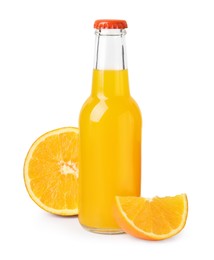 Delicious kombucha in glass bottle and orange isolated on white