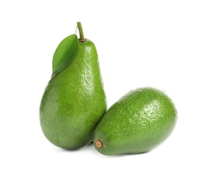 Photo of Ripe fresh avocados on white background