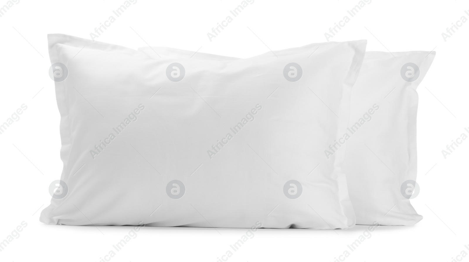 Photo of Two new soft pillows isolated on white