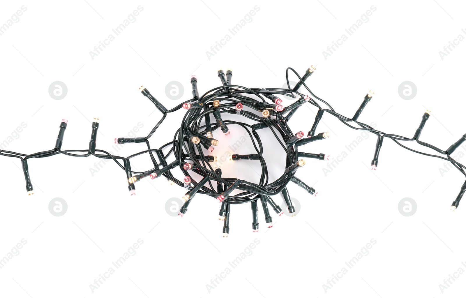 Photo of Beautiful Christmas lights on white background, top view