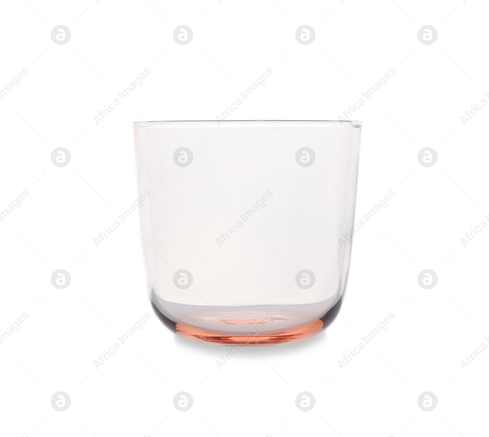 Photo of Color empty whiskey glass isolated on white