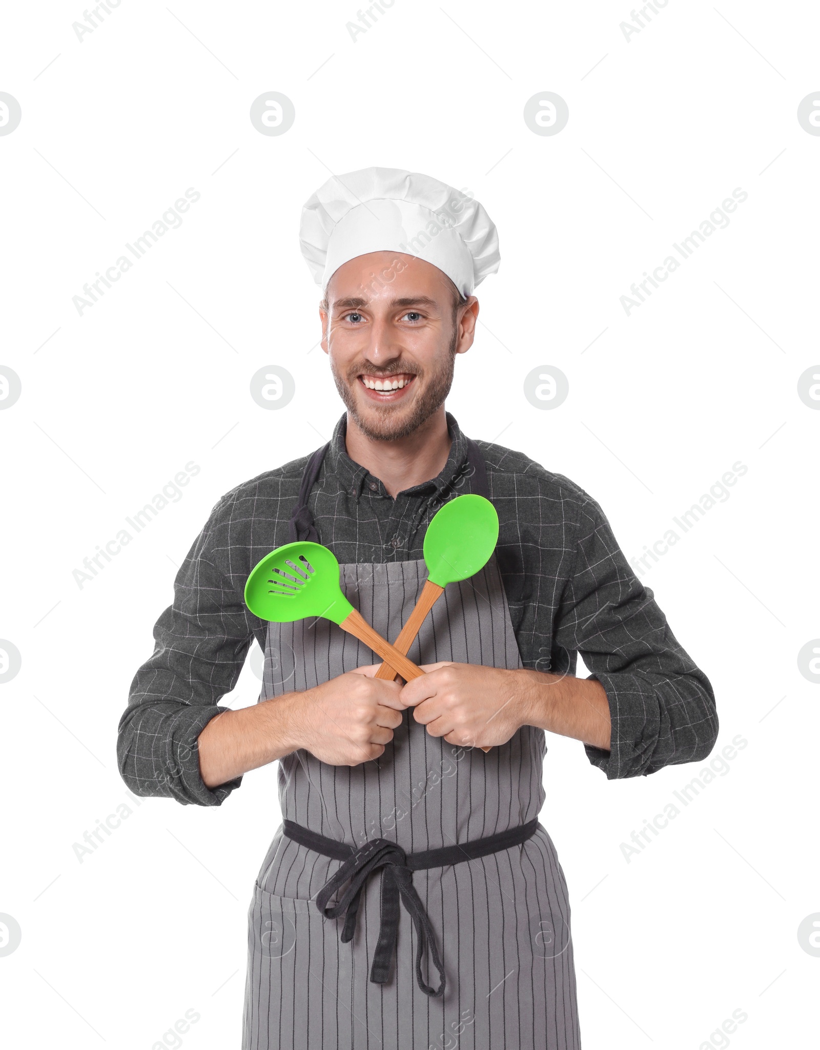 Photo of Professional chef with kitchen tools on white background