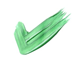 Photo of Smear of green paint on white background