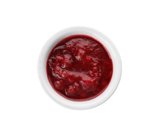 Photo of Bowl of cranberry sauce on white background, top view