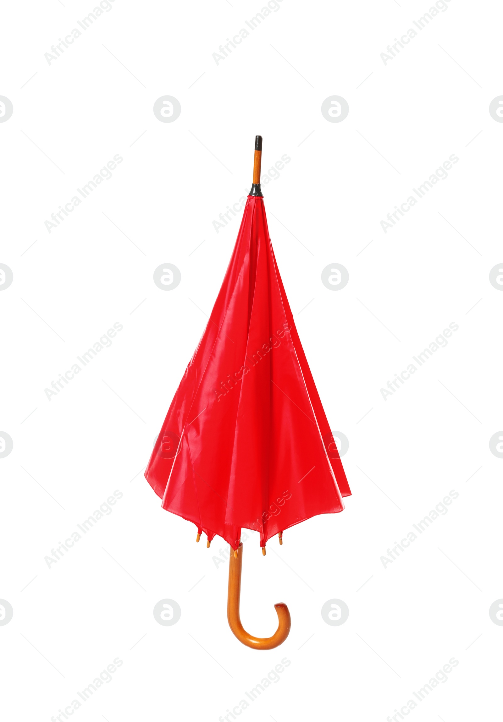 Photo of Modern closed red umbrella isolated on white