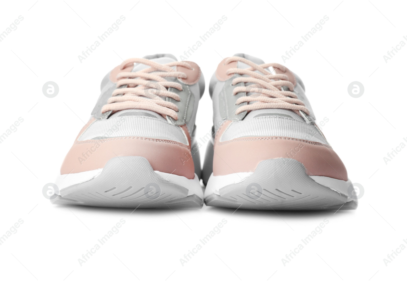 Photo of Pair of stylish sneakers on white background