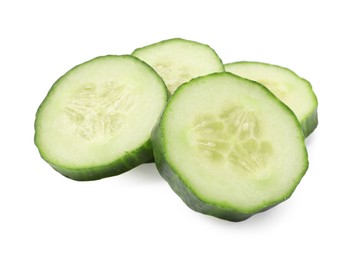 Photo of Slices of fresh cucumber isolated on white