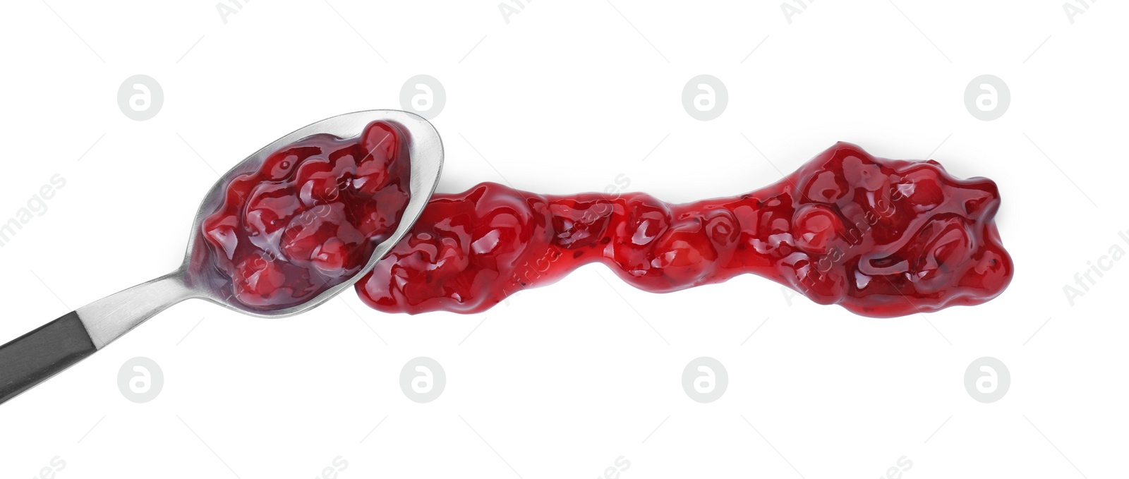 Photo of Spoon with fresh cranberry sauce isolated on white, top view